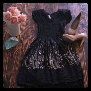 Black/violet dress.